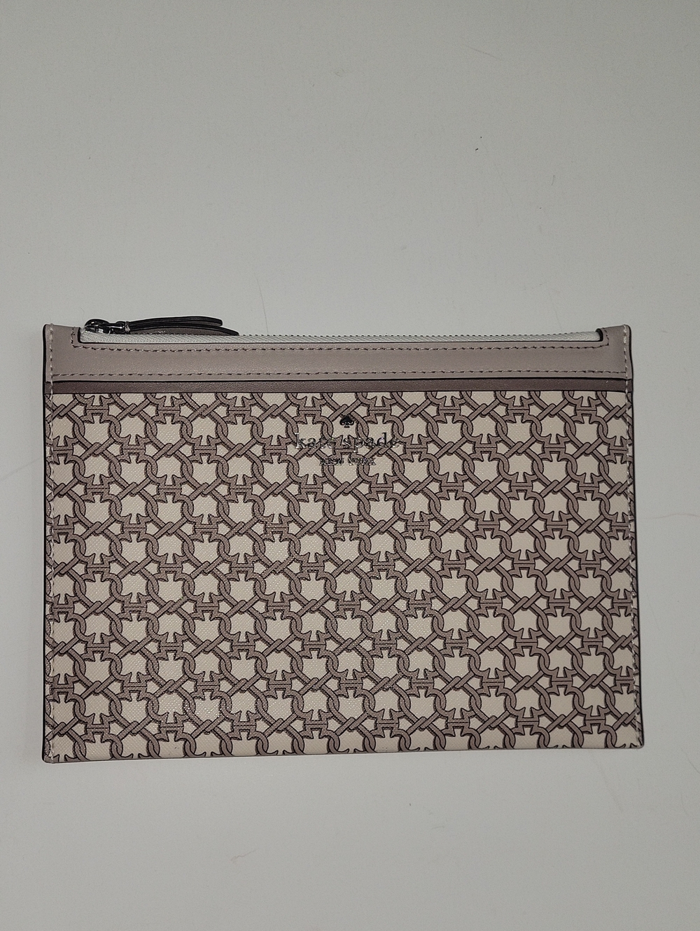Kate Spade Spade Link medium zip pouch featured in a multi geometric